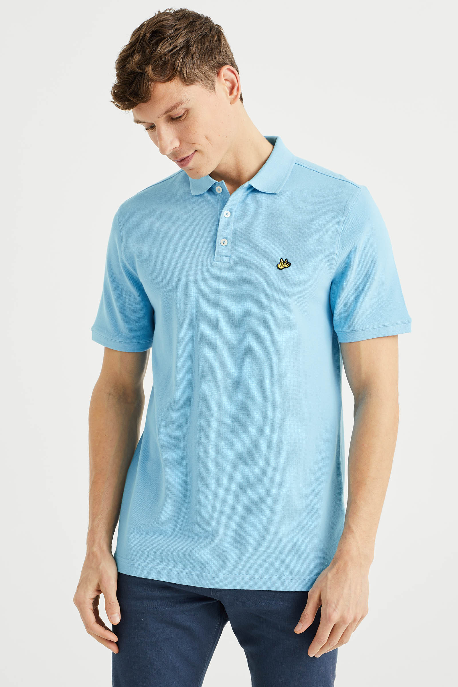 Polo slim fit homme à structure avec broderie | wefashion.com